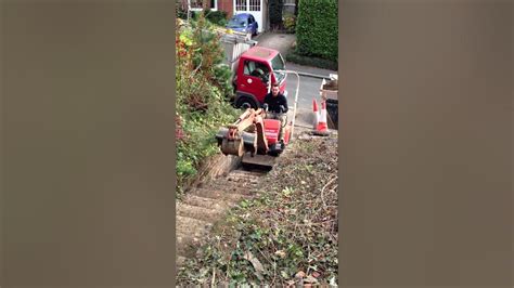 mini digger up stairs|Driving a mini.